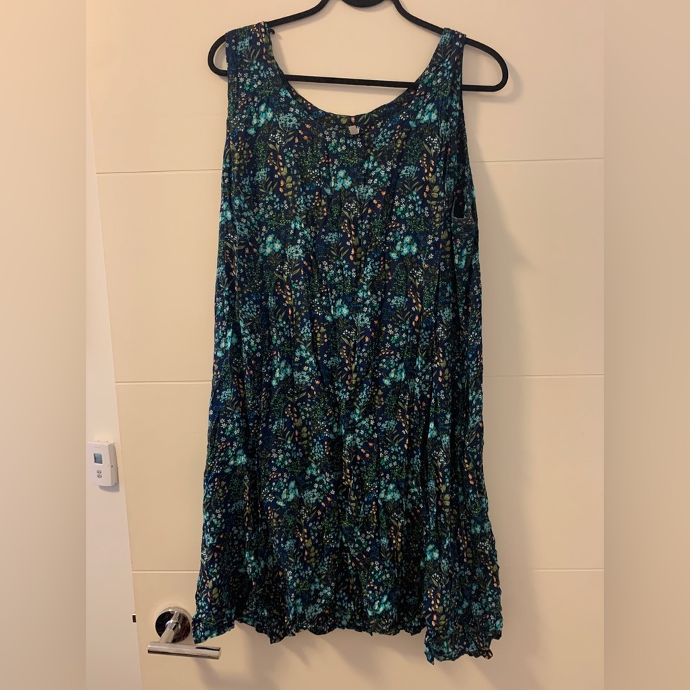 Lightweight (bamboo blend fabric). Great prints with tie back.